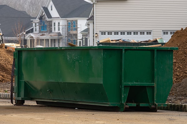construction dumpsters have restrictions on hazardous materials and certain other prohibited items